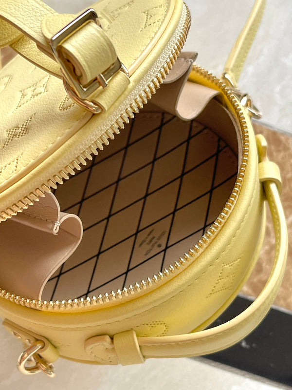 MINI BOITE CHAPEAU 13 IN BANANA YELLOW MONOGRAM PERFORATED CALFSKIN