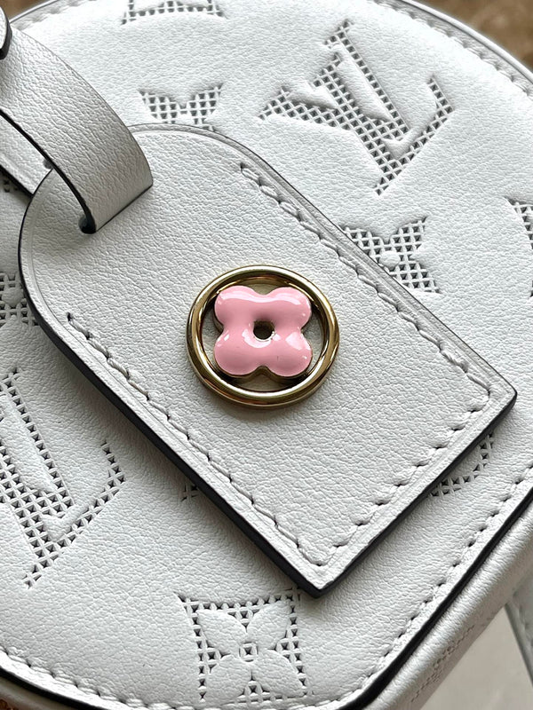 MINI BOITE CHAPEAU 13 IN PELLE DI VITELLO TRAFORATA CON MONOGRAMMA BIANCO