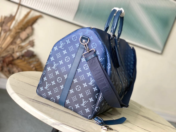 KEEPALL BANDOULIÈRE 55 IN TELA CON MONOGRAMMA SFUMATO VERDE NAVY