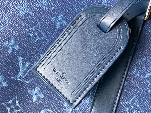 KEEPALL BANDOULIÈRE 55 IN TELA CON MONOGRAMMA SFUMATO VERDE NAVY