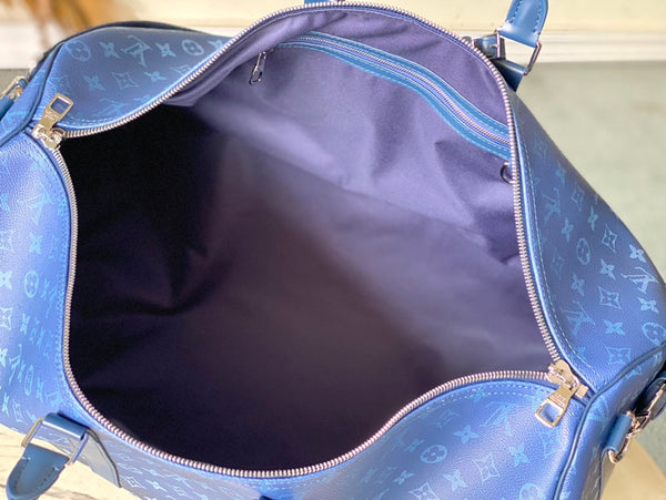 KEEPALL BANDOULIÈRE 55 IN TELA CON MONOGRAMMA SFUMATO VERDE NAVY