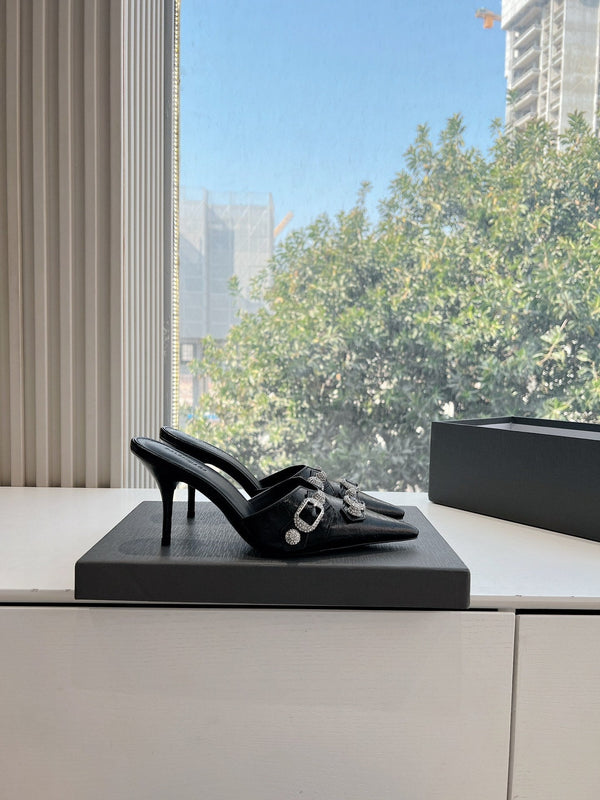 CRYSTAL BUCKLE BLACK WAX-OIL SHEEPSKIN HEELED MULES
