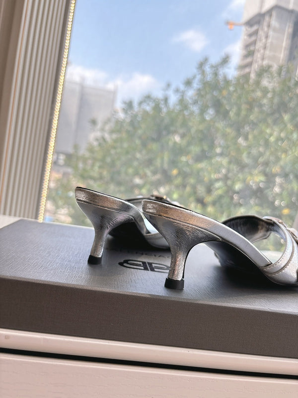 CAGOLE MID-HEEL MULES IN SILVER METALLIC CALFSKIN