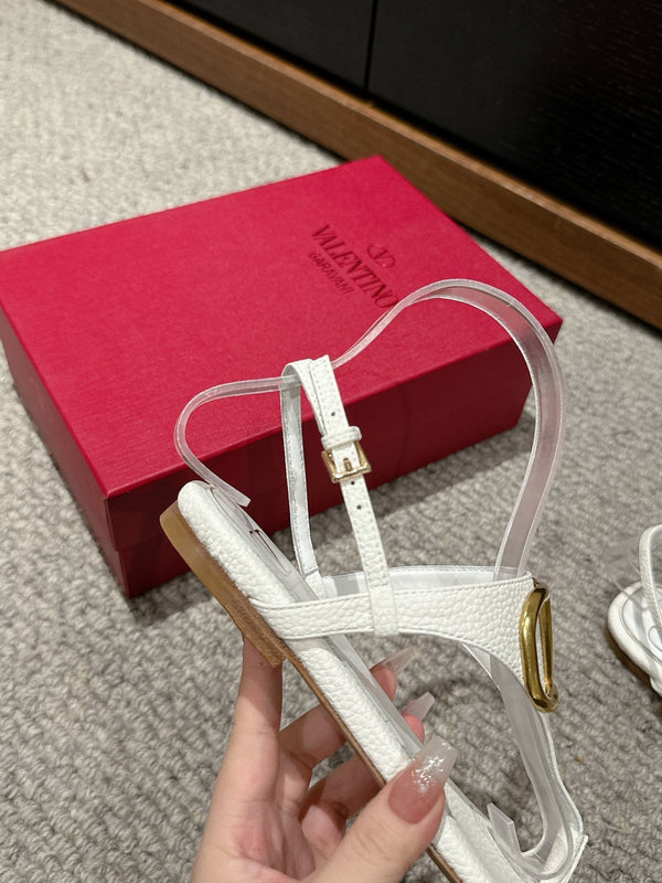 SANDALO INFRADITO IN VITELLO BIANCO CON LOGO ORO