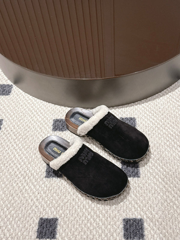Miumiu 25 Pantoufles garnies de shearling en daim noir et laine 547578
