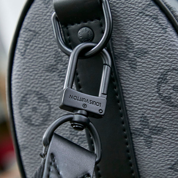 KEEPALL BANDOULIÈRE 25 IN CANNA DI FUCILE MONOGRAM ECLIPSE CANNA DI FUCILE IN PELLE DI VITELLO TURCHESE