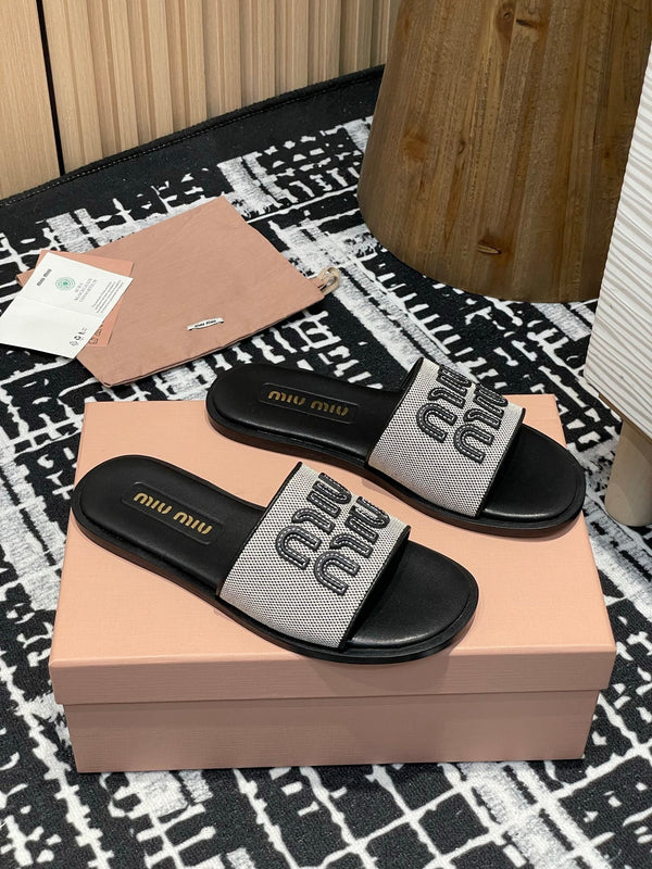 Miu 25S Beige and Black Canvas and leather slides 227133