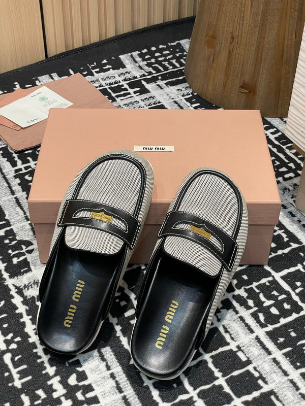 Miu 25S Mules in tela e pelle beige e nera 227137