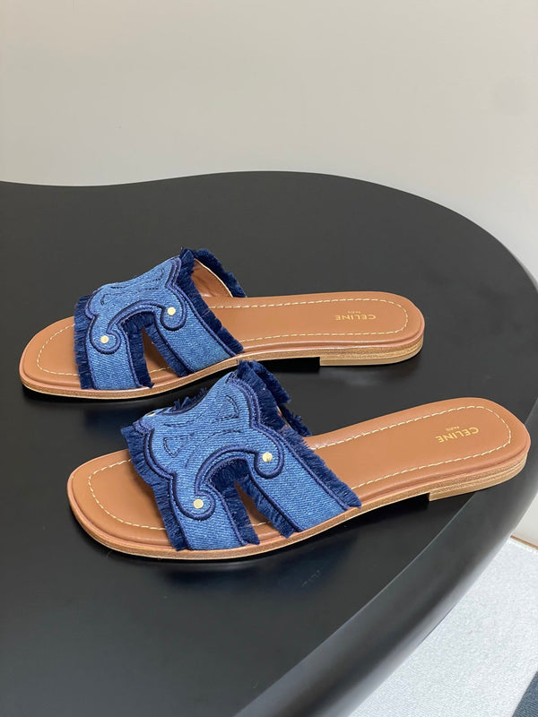 CL Marina Mule piatto con frange in denim blu 319736