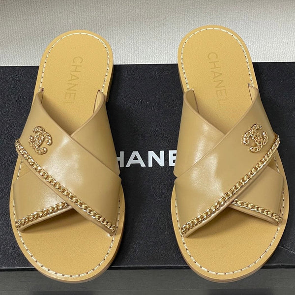 CC 26 Mule à bride croisée en peau de mouton beige 593302