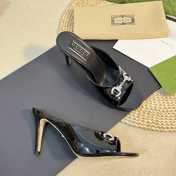 GG Women's Horsebit mid-heel slide sandal in glossy black leather