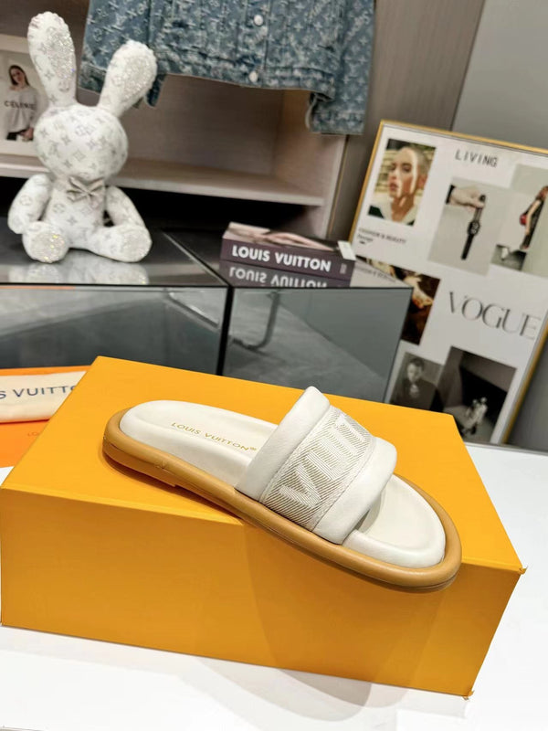 lv bliss flat mule cream canvas calfskin