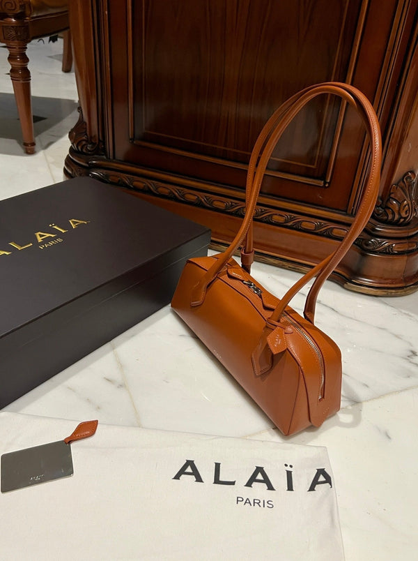 LE TECKEL MEDIUM BAG 33 IN BRONZE ORANGE GOATSKIN