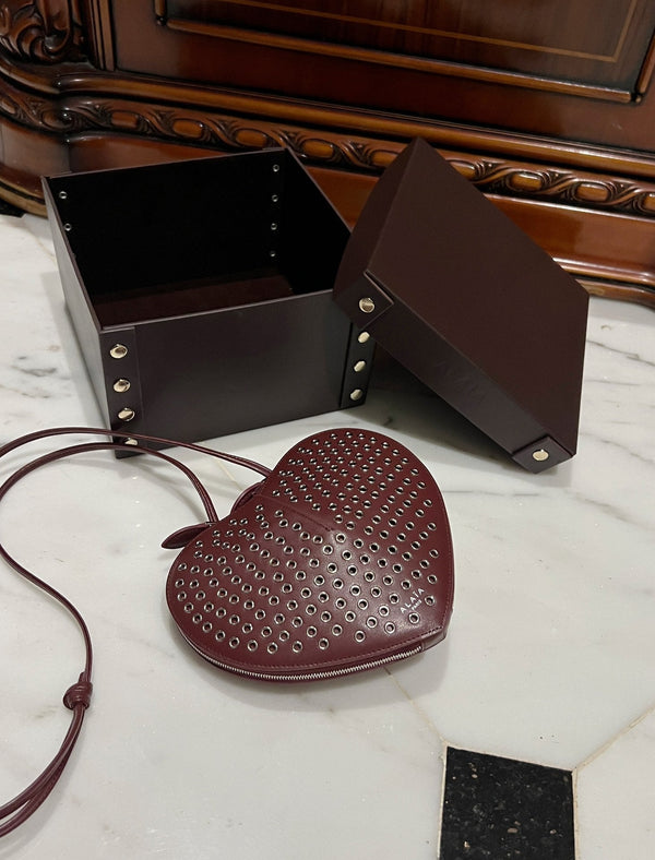 LE COEUR BAG 21 IN BURGUNDY RED STUDDED CALFSKIN