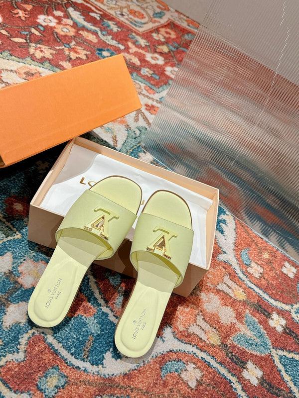lv capri flat mule pastel yellow calfskin