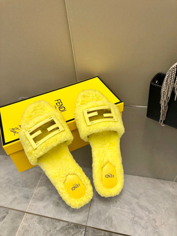FENDI BAGUETTE SLIDE SLIPPERS IN BRIGHT YELLOW WOOL