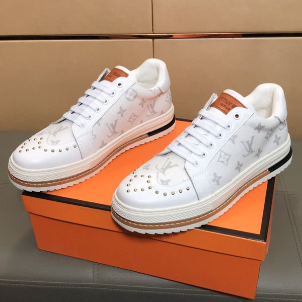 LV TRAINER IN WHITE MONOGRAM CALFSKIN