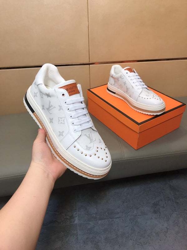 LV TRAINER IN WHITE MONOGRAM CALFSKIN