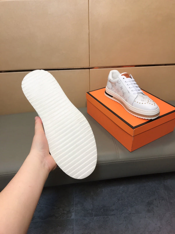 LV TRAINER IN WHITE MONOGRAM CALFSKIN