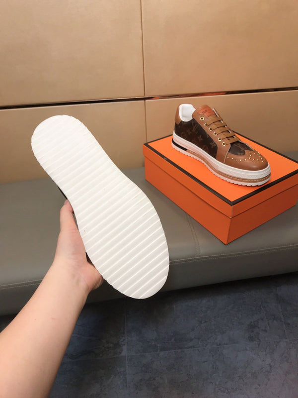 LV TRAINER IN BROWN MONOGRAM CALFSKIN