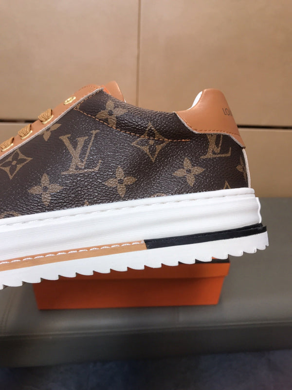 LV TRAINER IN BROWN MONOGRAM CALFSKIN