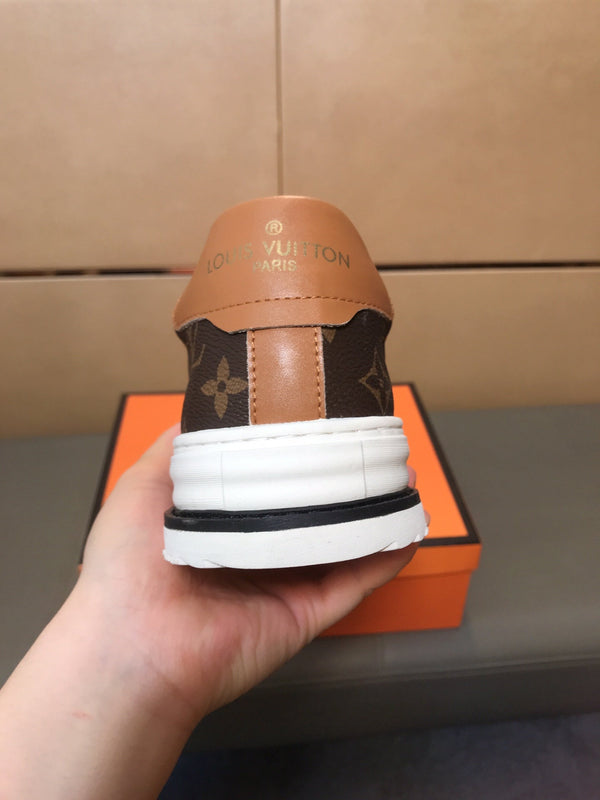 LV TRAINER IN BROWN MONOGRAM CALFSKIN