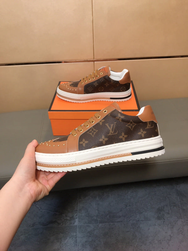 LV TRAINER IN BROWN MONOGRAM CALFSKIN