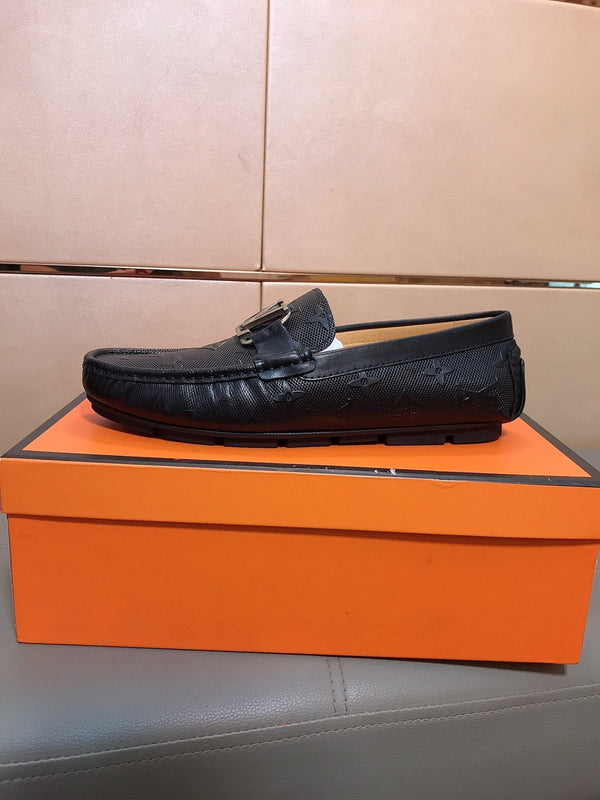 LV LOAFERS IN BLACK CALFSKIN WITH BRANDED EMBOSSING