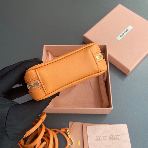 MICRO BAG KEYCHAIN 11 IN HOT CINNAMON ORANGE CALFSKIN EMBOSSED LOGO