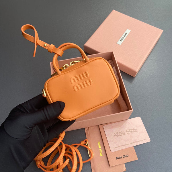 Miu 11 Orange Beau Leather Micro Bag 240361