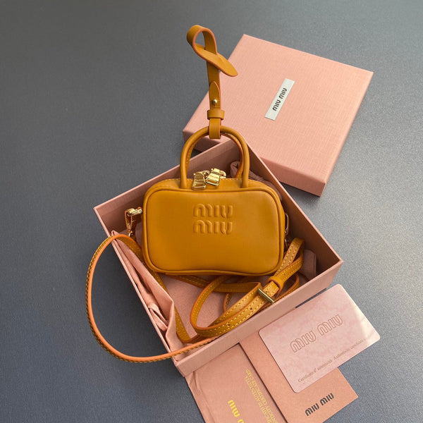 Miu 11 Happy Orange Beau Leather Micro Bag 240369