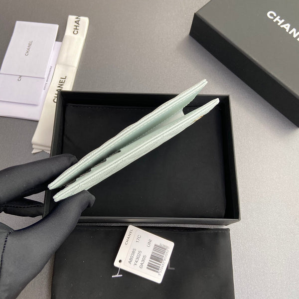 CC Passport Holder Light Blue Caviar 234701