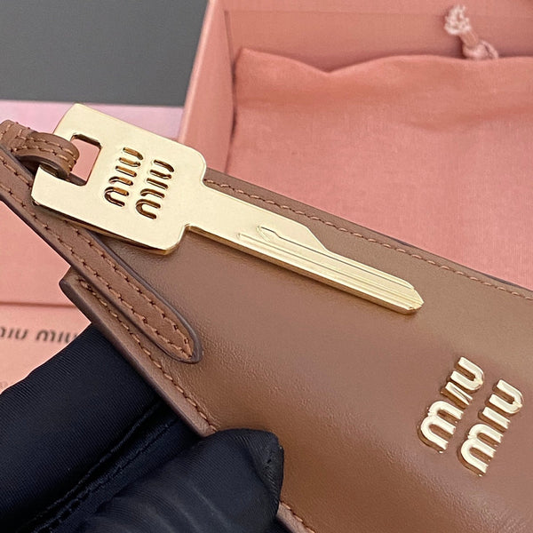 Leather Bag Charm With Key Brown Calfskin 240333