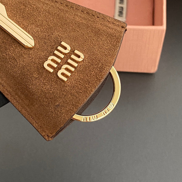 Leather Bag Charm With Key Brown Suede 240339