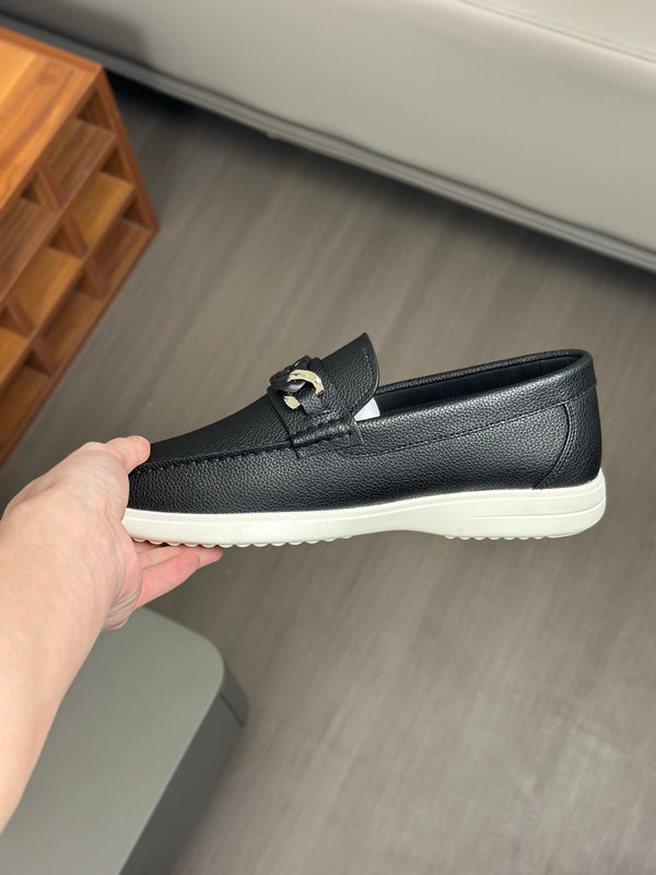 Mocassino da uomo GG in pelle di vacchetta nera 573501