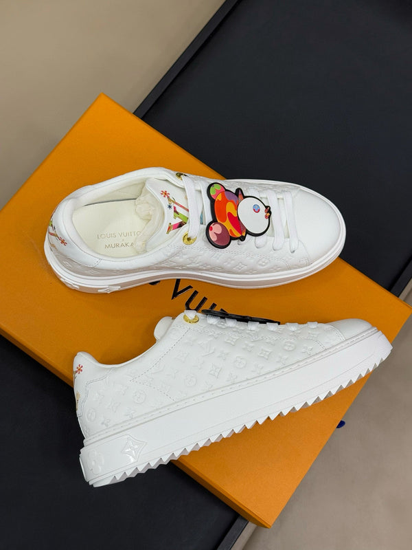 TIME OUT SNEAKER IN WHITE EMBOSSED MONOGRAM CALFSKIN