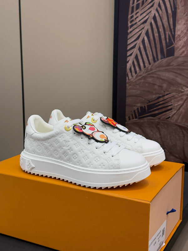 TIME OUT SNEAKER IN WHITE EMBOSSED MONOGRAM CALFSKIN