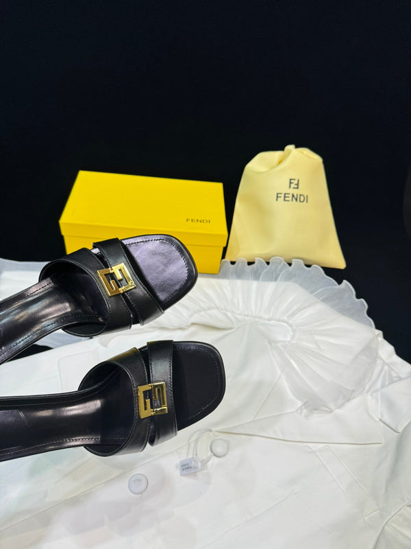 FENDI MEDIUM-HEELED 55 MM MULE IN BLACK LAMBSKIN WITH GOLD HARDWARE