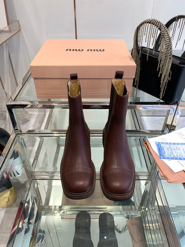 Stivali Miu in pelle di vacchetta mista vegetale color marrone terra