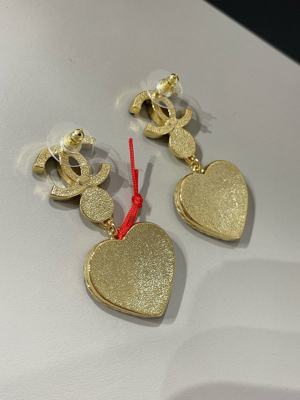 orecchini pendenti in denim blu con cuore cc