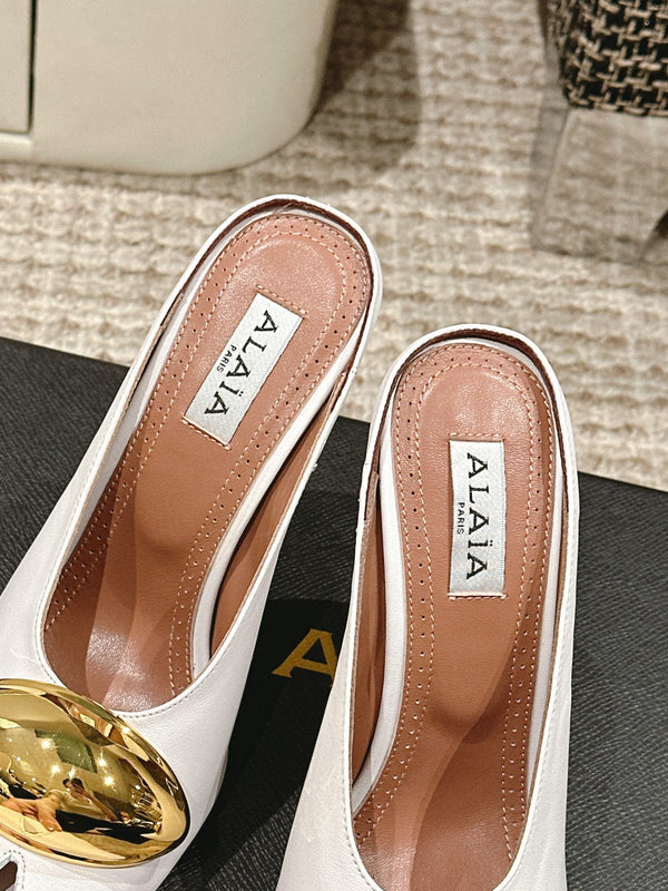 MULES GIOIELLO ALAIA SPIKE IN PELLE DI VITELLO BIANCA CON FERRAMENTA ORO