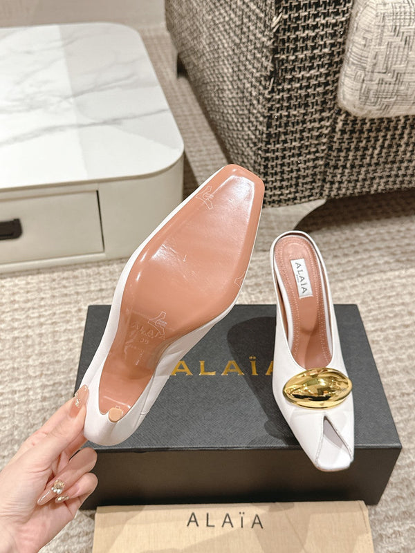 MULES GIOIELLO ALAIA SPIKE IN PELLE DI VITELLO BIANCA CON FERRAMENTA ORO