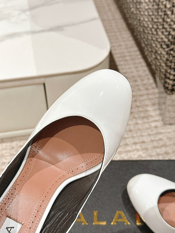 ALAIA ROUND-TOE HIGH HEELS 10 CM IN WHITE CALFSKIN