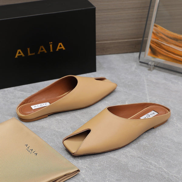 ALAIA FLAT MULE IN SEPIA TAN LAMBSKIN