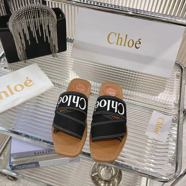 CHLOÉ WOODY MULE IN BLACK DENIM WITH WHITE LOGO