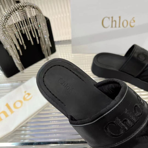 CHLOÉ MILA FLAT SLIDES 5 CM IN BLACK CALFSKIN AND RE-NYLON