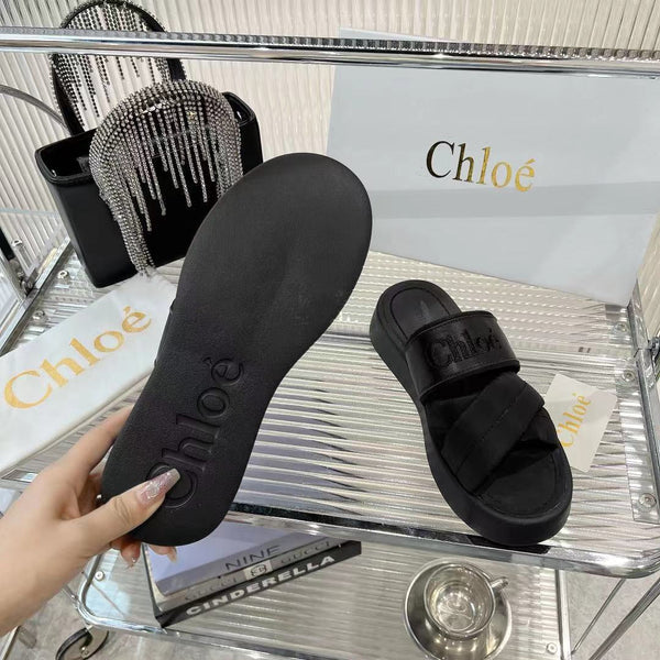 CHLOÉ MILA FLAT SLIDES 5 CM IN BLACK CALFSKIN AND RE-NYLON