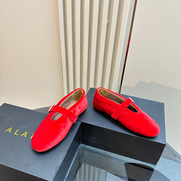ALAIA BALLET FLATS IN CHERRY RED VELVET