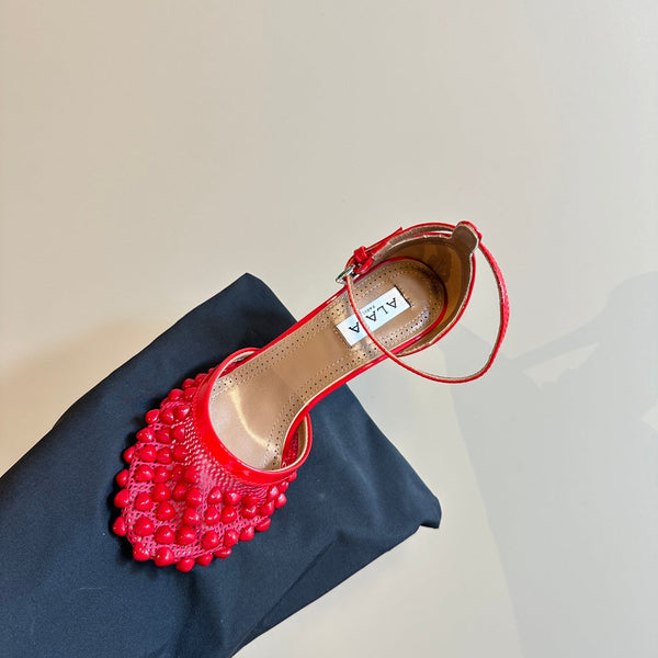 ALAIA HIGH FISHNET PUMPS WITH STUDS IN CHERRY RED LYCRA MESH AND LAMBSKIN