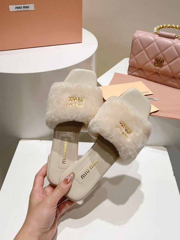 Mules Miu Miu en cuir beige clair et fourrure 739562
